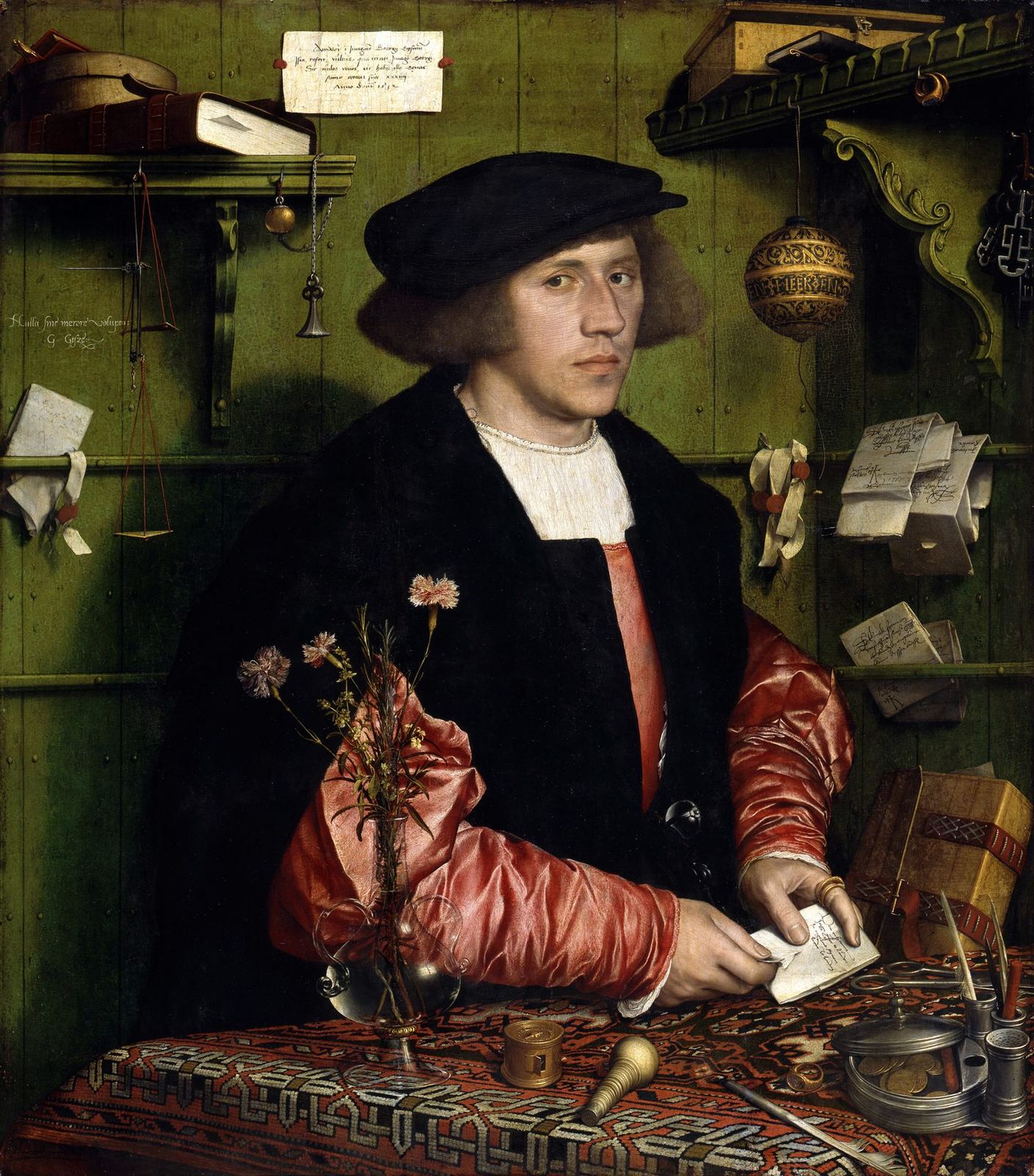 The merchant Georg Gisze at his desk among letters, scales and account books